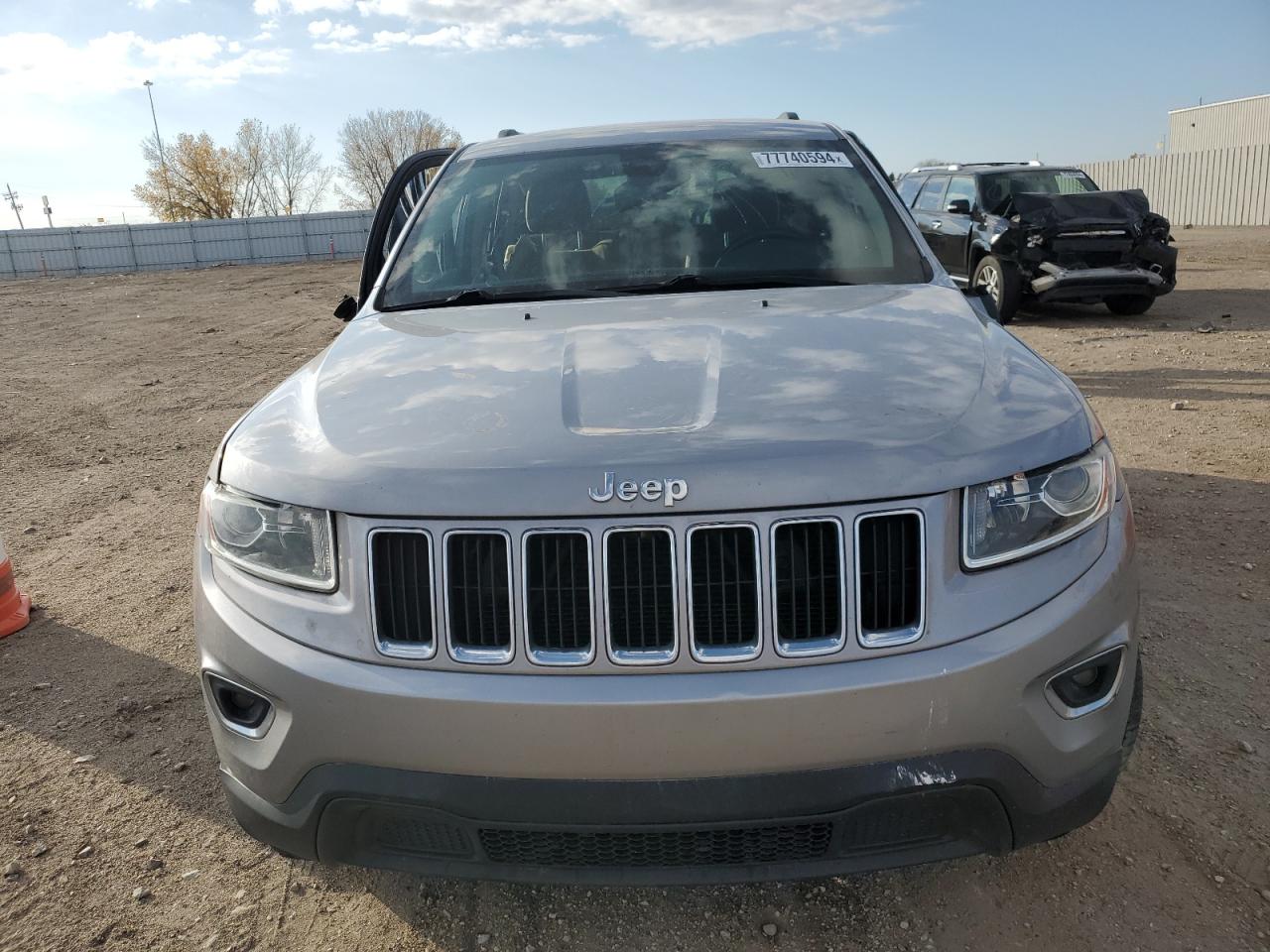 2014 Jeep Grand Cherokee VIN 1C4RJFAG5EC333660 Copart auction photo, front end / side damage thumbnail 5