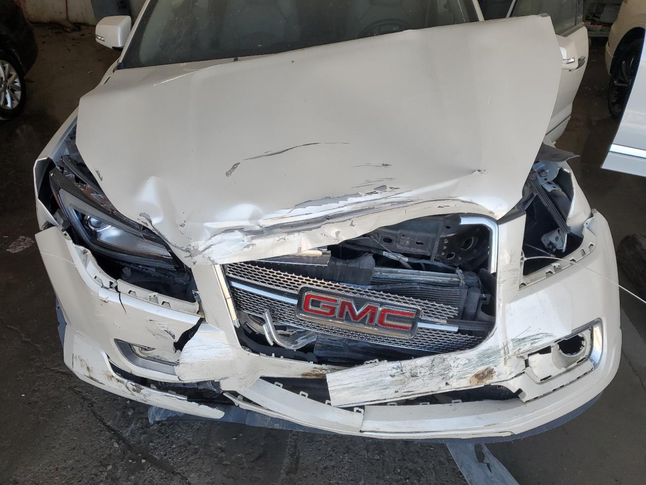 2014 GMC Acadia VIN 1GKKRTKD4EJ293181 Copart auction photo, front end / minor dent/scratches damage thumbnail 12