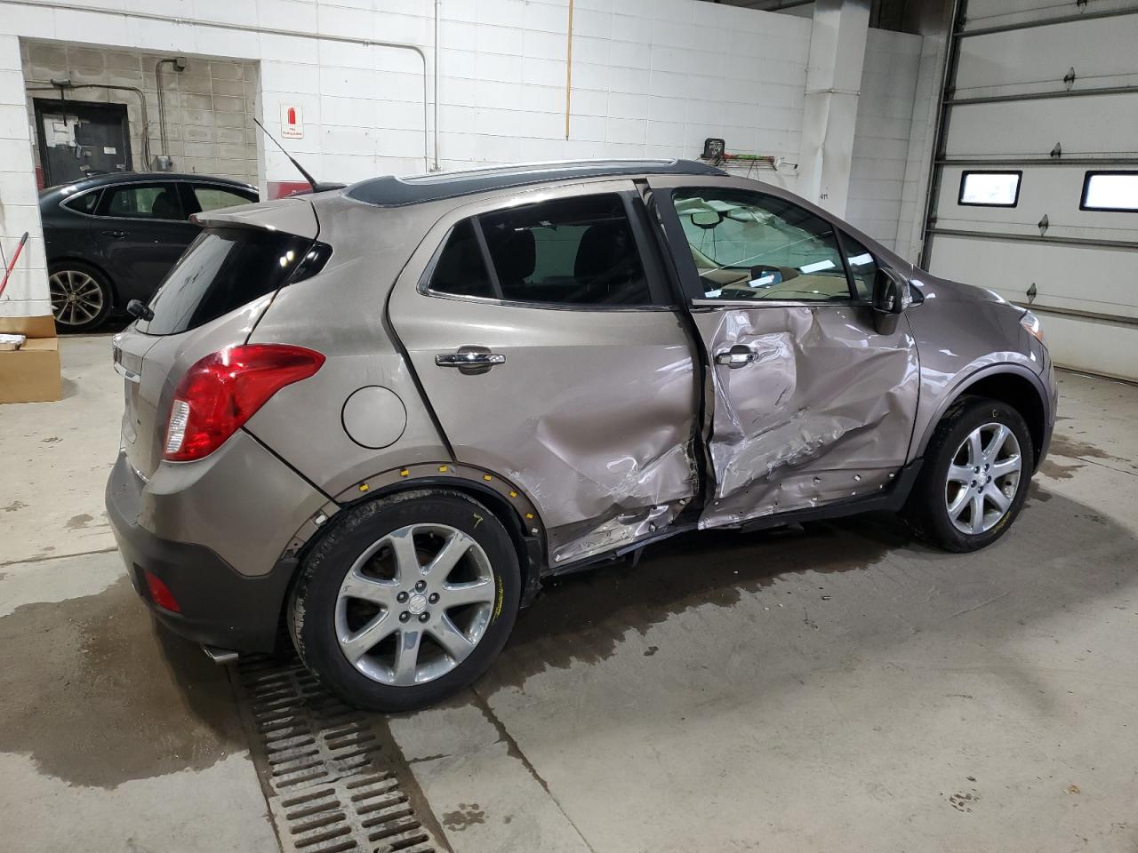 2014 Buick Encore VIN KL4CJHSB5EB661570 Copart auction photo, side / rear end damage thumbnail 3