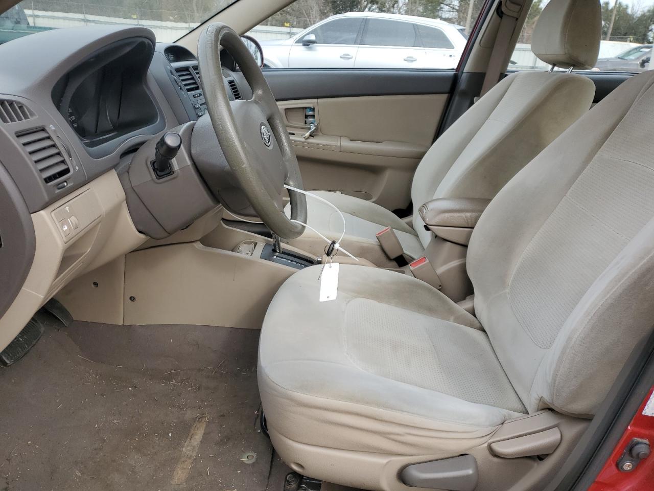 2009 KIA Spectra VIN KNAFE221695616392 Copart auction photo, front end / minor dent/scratches damage thumbnail 7