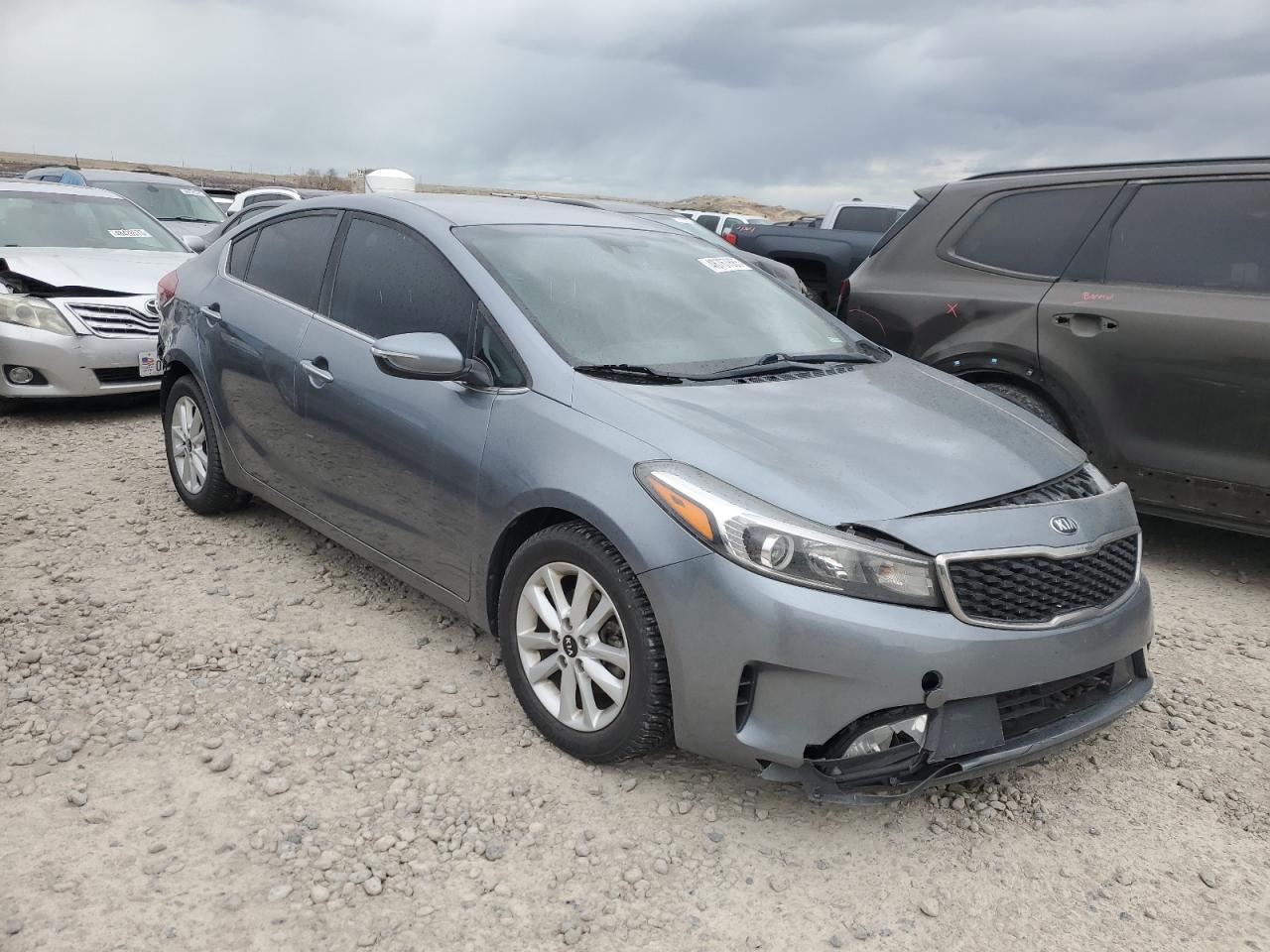 2017 KIA Forte VIN 3KPFL4A75HE125700 Copart auction photo, front end / side damage thumbnail 4