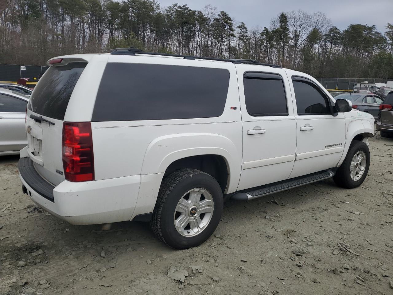 2009 Chevrolet Suburban VIN 1GNFK263X9R150750 Copart auction photo, front end damage thumbnail 3