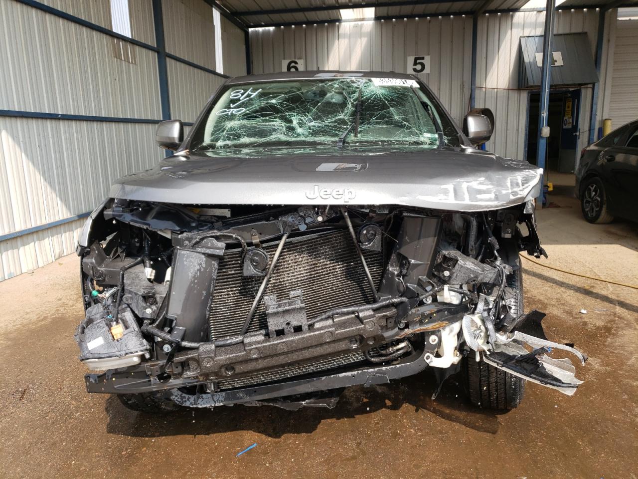 2012 Jeep Grand Cherokee VIN 1C4RJFAG0CC165214 Copart auction photo, all over damage thumbnail 5