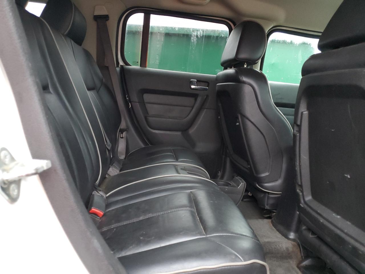 2009 Hummer H3 VIN 5GTEN13E998152256 Copart auction photo, side / front end damage thumbnail 11