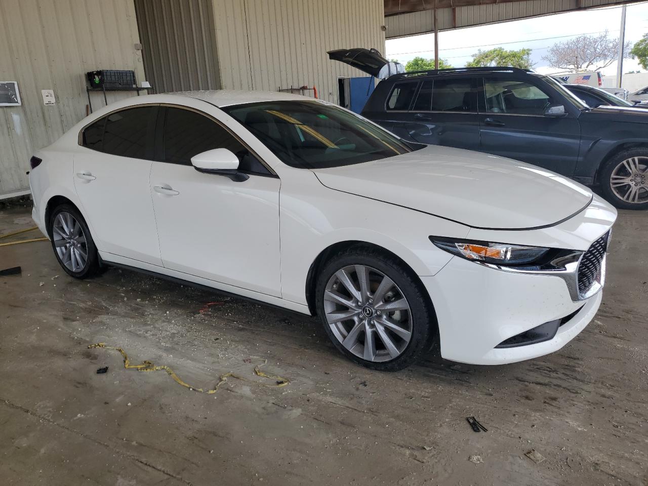 2021 Mazda 3 VIN JM1BPABL6M1325317 Copart auction photo, water/flood damage thumbnail 4