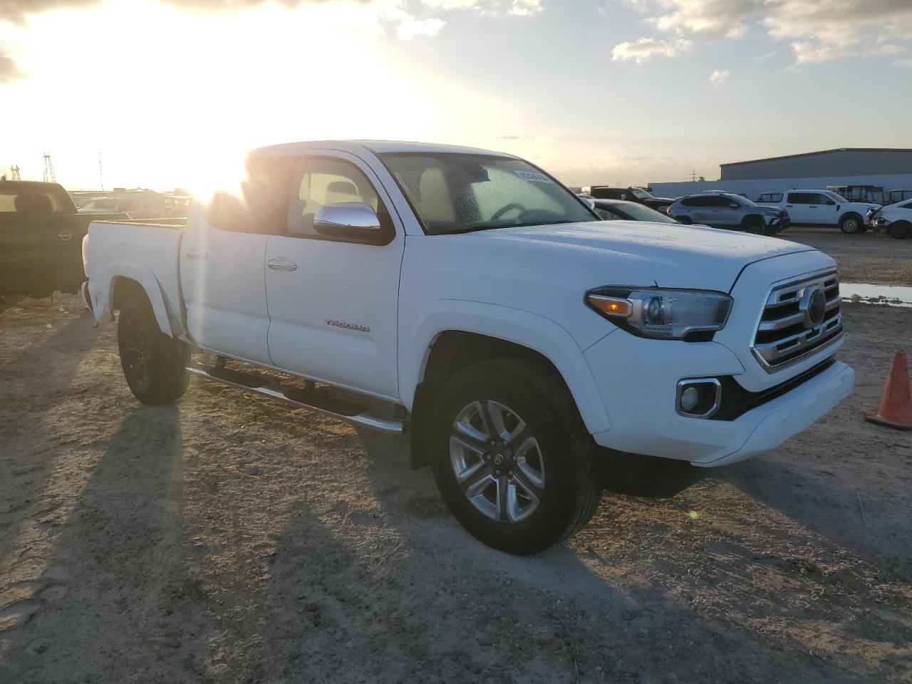 2018 Toyota Tacoma VIN 5TFEZ5CNXJX058903 Copart auction photo, rear end damage thumbnail 4
