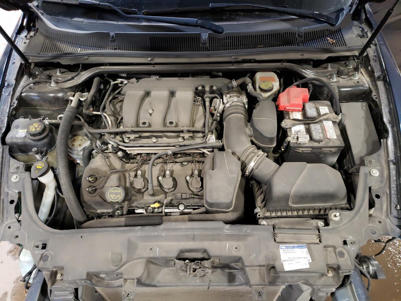 2017 Ford Taurus VIN 1FAHP2E88HG116368 Copart auction photo, vandalism / stripped damage thumbnail 11