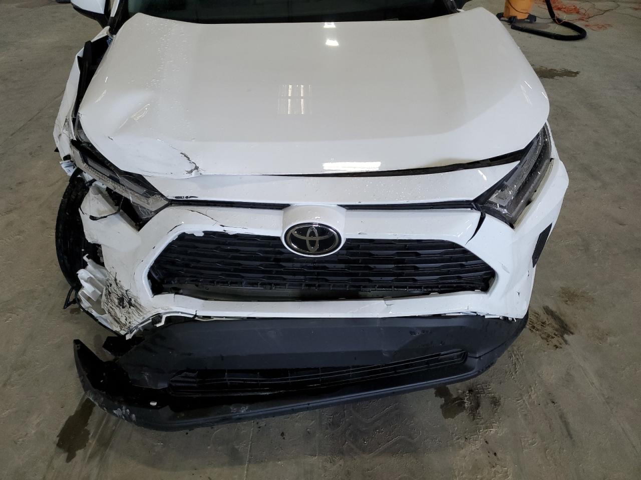 2023 Toyota RAV 4 VIN 2T3W1RFVXPC215858 Copart auction photo, front end damage thumbnail 13