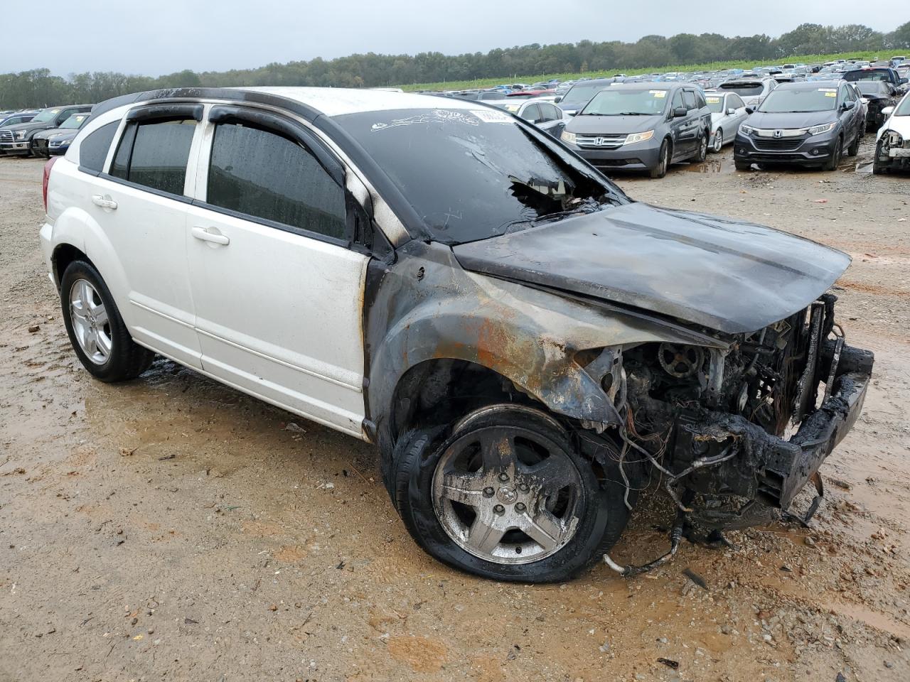 2009 Dodge Caliber VIN 1B3HB48A29D147588 Copart auction photo, burn damage thumbnail 4