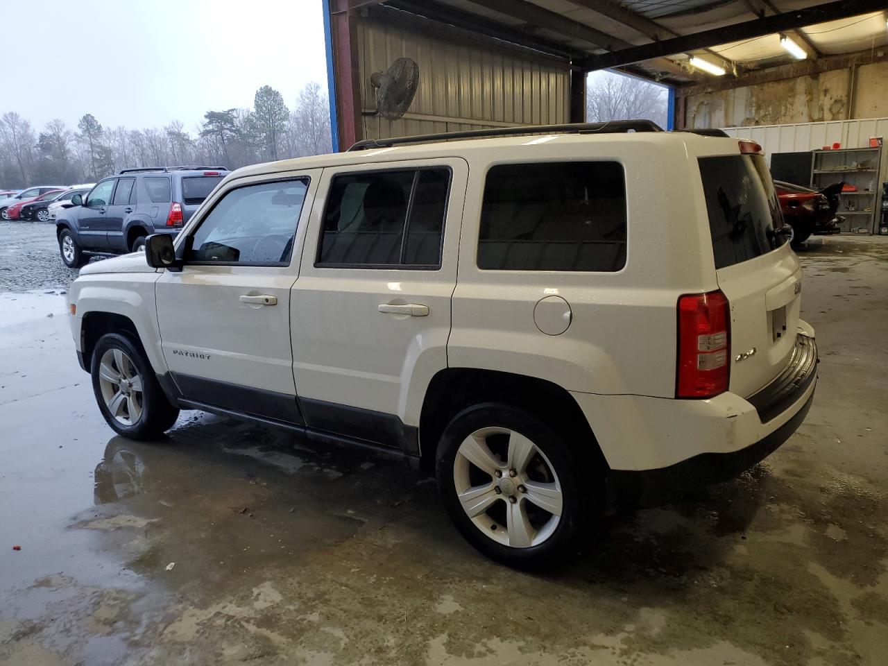 2014 Jeep Liberty (Patriot) VIN 1C4NJRFB5ED659675 Copart auction photo, rear end / minor dent/scratches damage thumbnail 2
