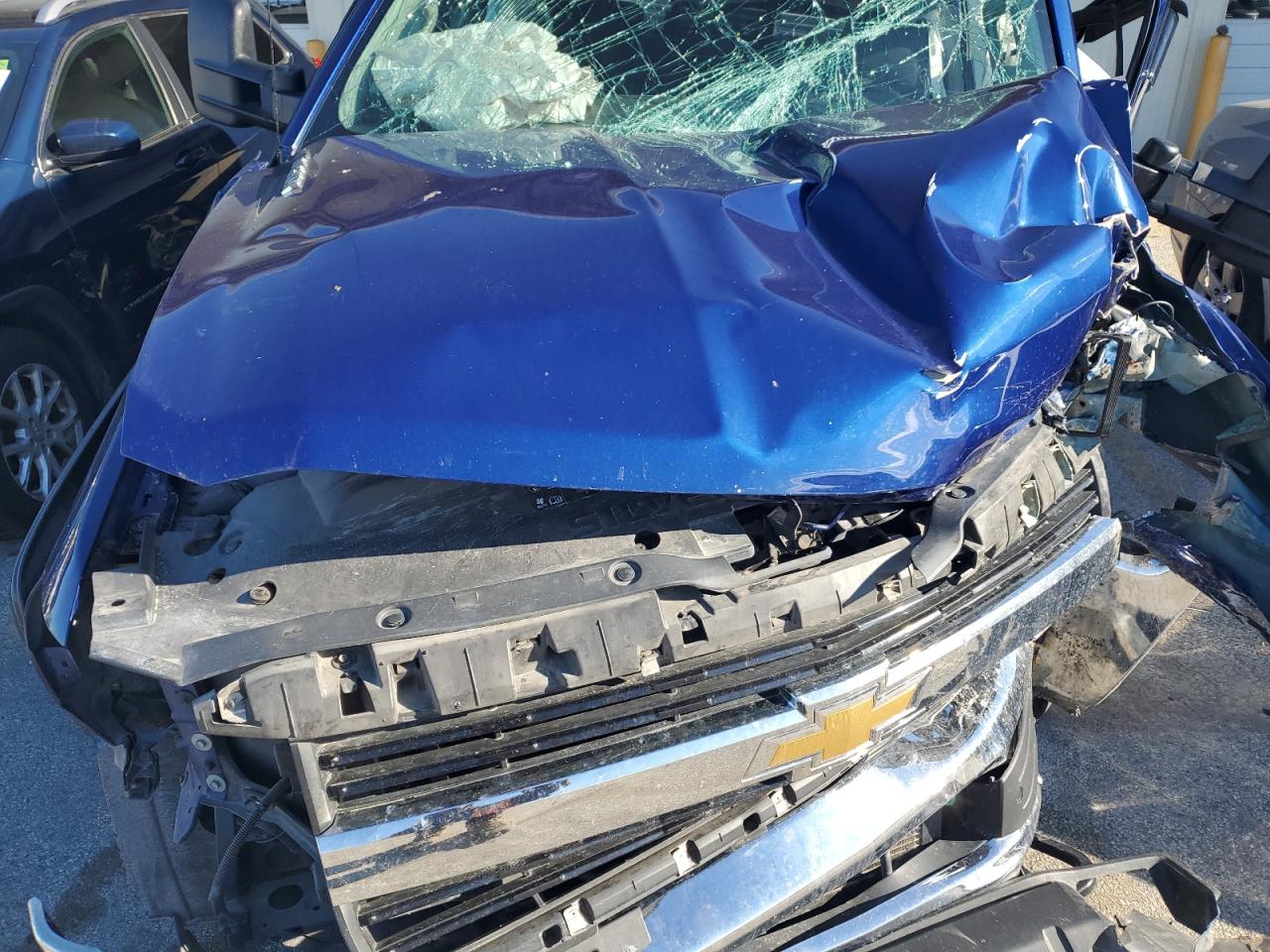 2015 Chevrolet Silverado VIN 1GC1KWE81FF161057 Copart auction photo, all over damage thumbnail 12