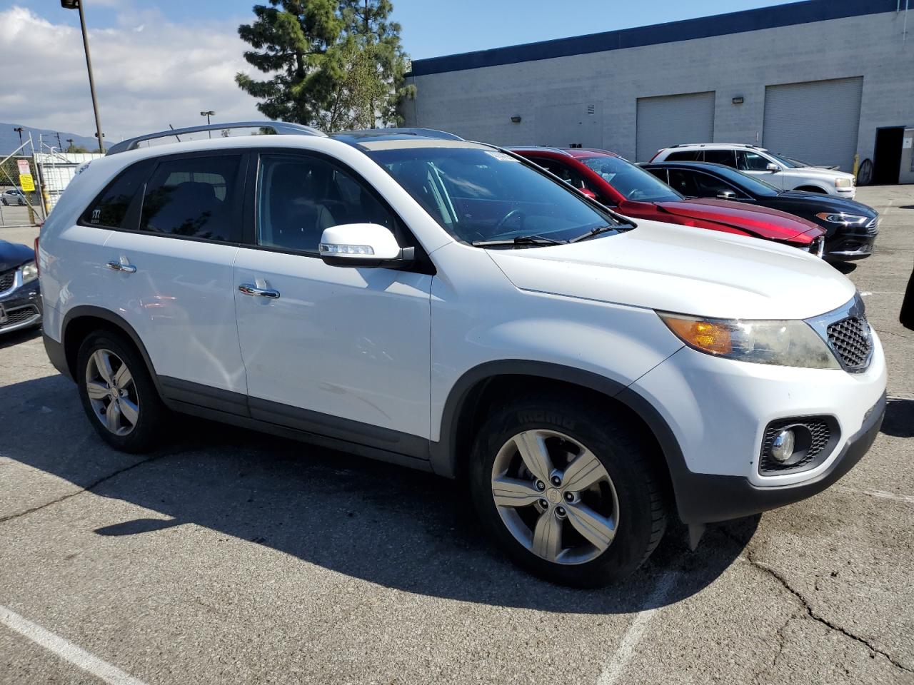 2012 KIA Sorento VIN 5XYKU4A21CG300276 Copart auction photo, rear end / undercarriage damage thumbnail 4