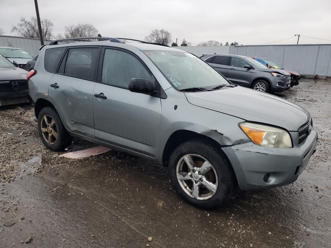 2006 Toyota RAV 4 VIN JTMBD33V065013929 Copart auction photo, all over damage thumbnail 4
