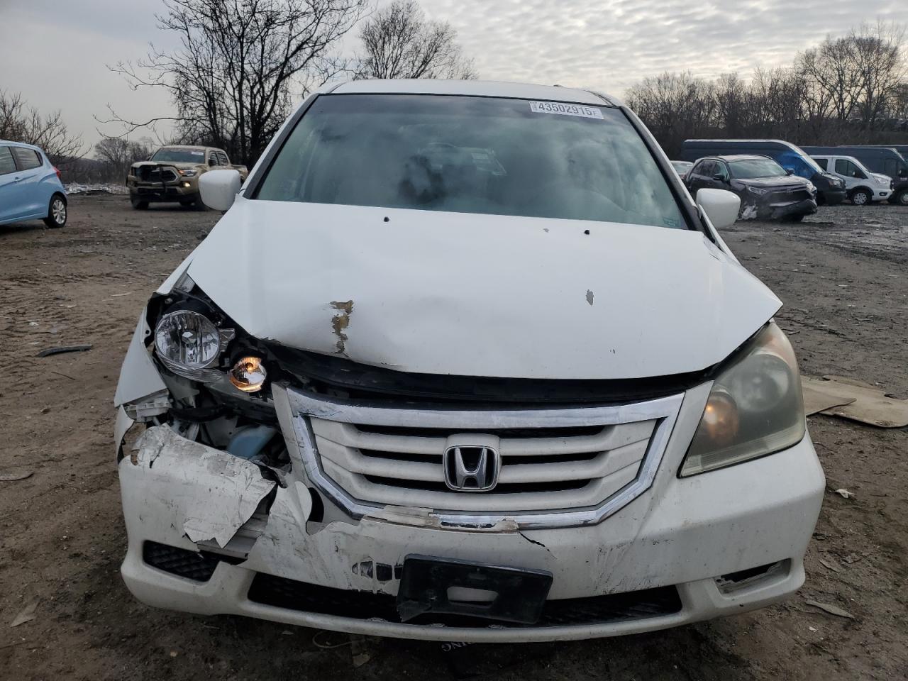 2010 Honda Odyssey VIN 5FNRL3H52AB010712 Copart auction photo, front end damage thumbnail 5
