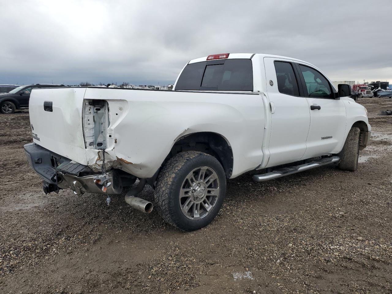 2013 Toyota Tundra VIN 5TFRM5F17DX062002 Copart auction photo, rear end / minor dent/scratches damage thumbnail 3