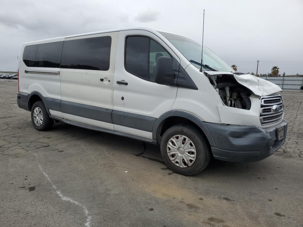 2015 Ford Transit VIN 1FBZX2YM6FKA83778 Copart auction photo, front end damage thumbnail 4
