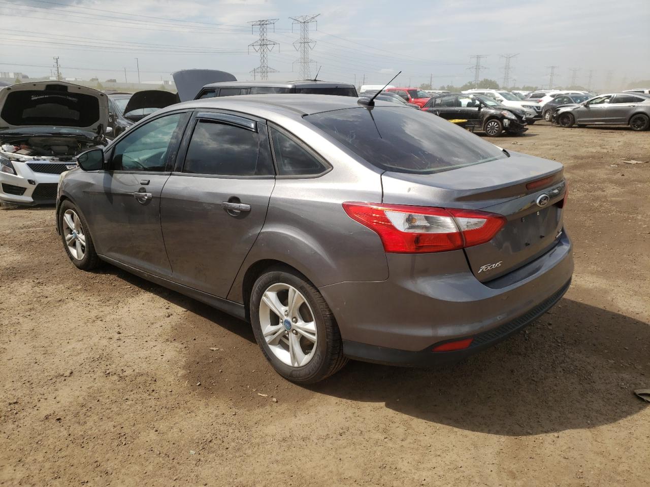 2014 Ford Focus VIN 1FADP3F24EL130933 Copart auction photo, normal wear / minor dent/scratches damage thumbnail 2