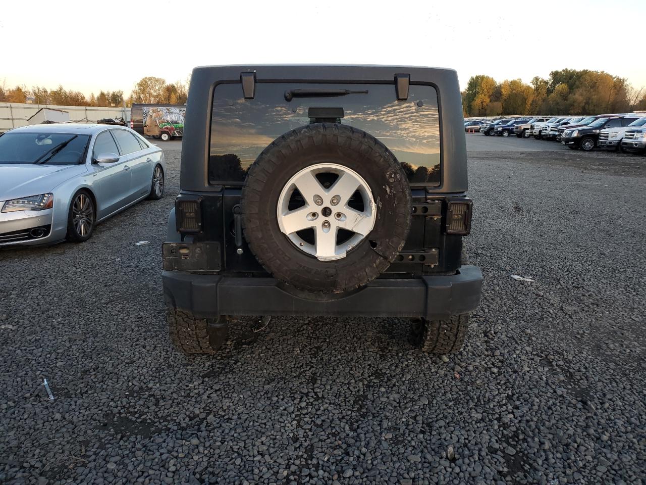2012 Jeep Wrangler VIN 1C4HJWDG6CL200037 Copart auction photo, side damage thumbnail 6