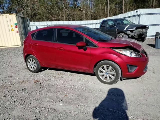 2012 Ford Fiesta VIN 3FADP4EJ4CM117464 Copart auction photo, front end / minor dent/scratches damage thumbnail 11