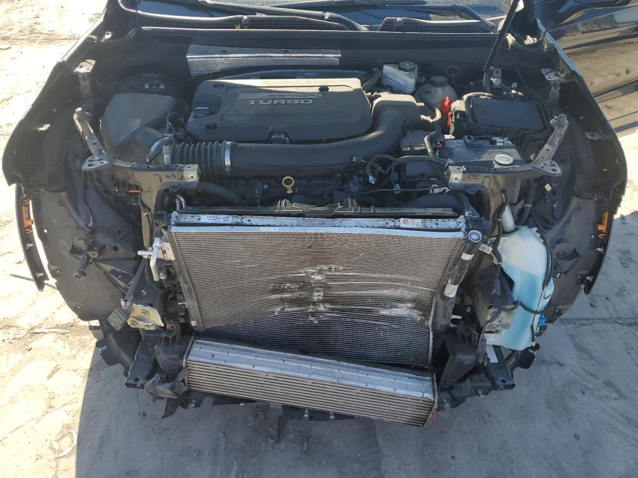 2019 Cadillac XT4 VIN 1GYFZER49KF199403 Copart auction photo, front end / hail damage thumbnail 12
