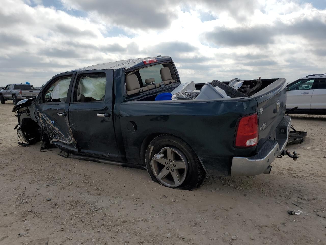 2011 Dodge RAM VIN 1D7RB1CT2BS629057 Copart auction photo, rollover damage thumbnail 2