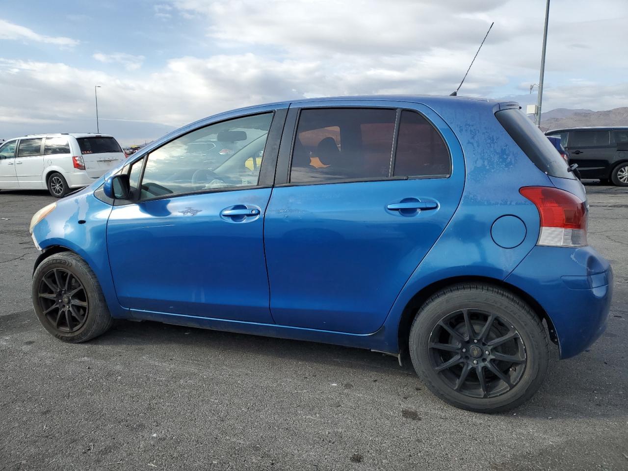 2011 Toyota Yaris VIN JTDKT4K38B5335821 Copart auction photo, front end damage thumbnail 2