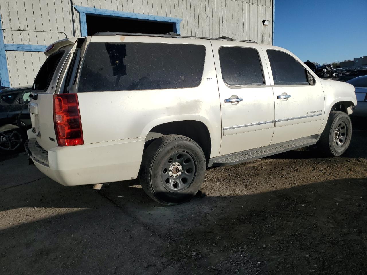 2010 Chevrolet Suburban VIN 1GNUCKE00AR227545 Copart auction photo, stripped damage thumbnail 3