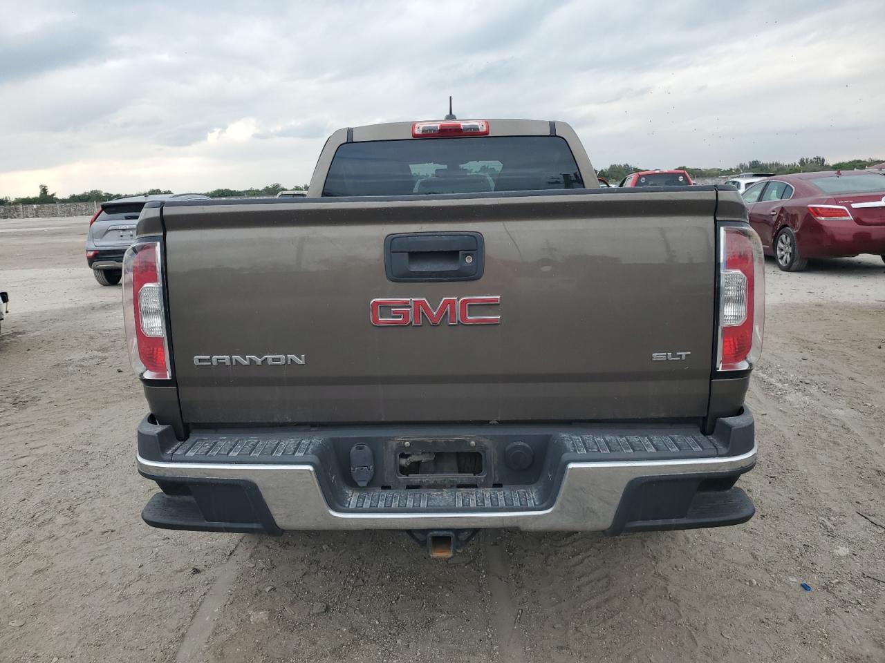 2015 GMC Canyon VIN 1GTG5CE31F1118775 Copart auction photo, side / rear end damage thumbnail 6