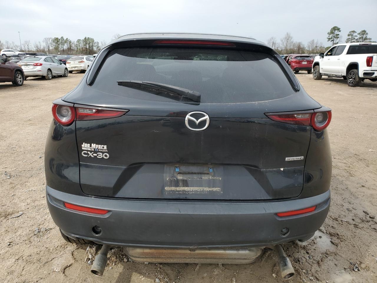 2021 Mazda CX-30 VIN 3MVDMABL4MM257702 Copart auction photo, front end / side damage thumbnail 6