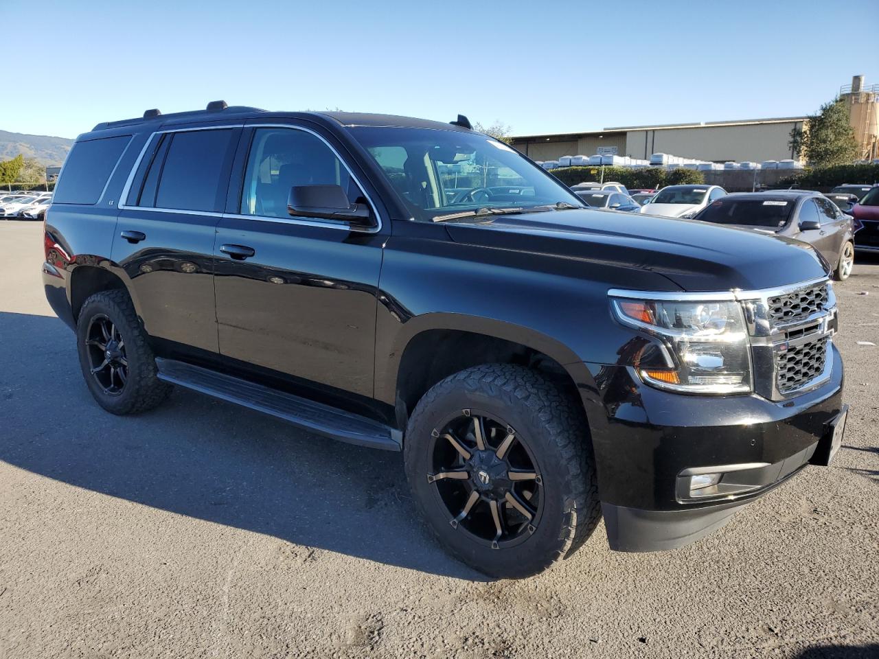 2015 Chevrolet Tahoe VIN 1GNSKBKC7FR654429 Copart auction photo, minor dent/scratches damage thumbnail 4