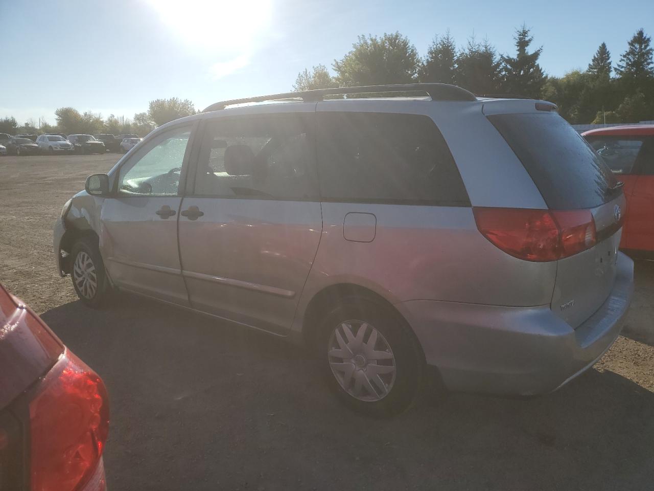 2010 Toyota Sienna VIN 5TDZK4CCXAS335182 Copart auction photo, front end / side damage thumbnail 2
