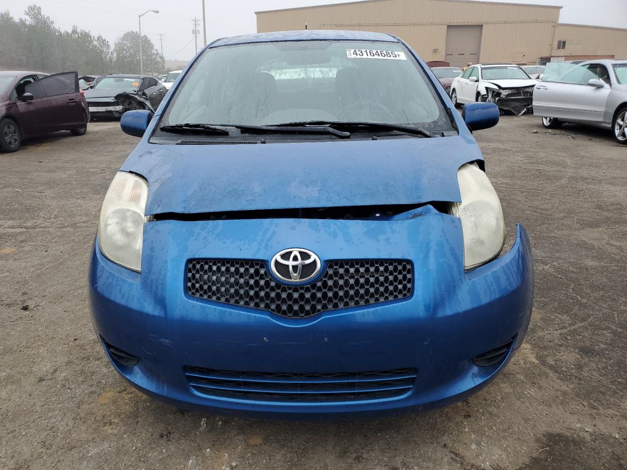 2008 Toyota Yaris VIN JTDJT923985179760 Copart auction photo, front end / side damage thumbnail 5
