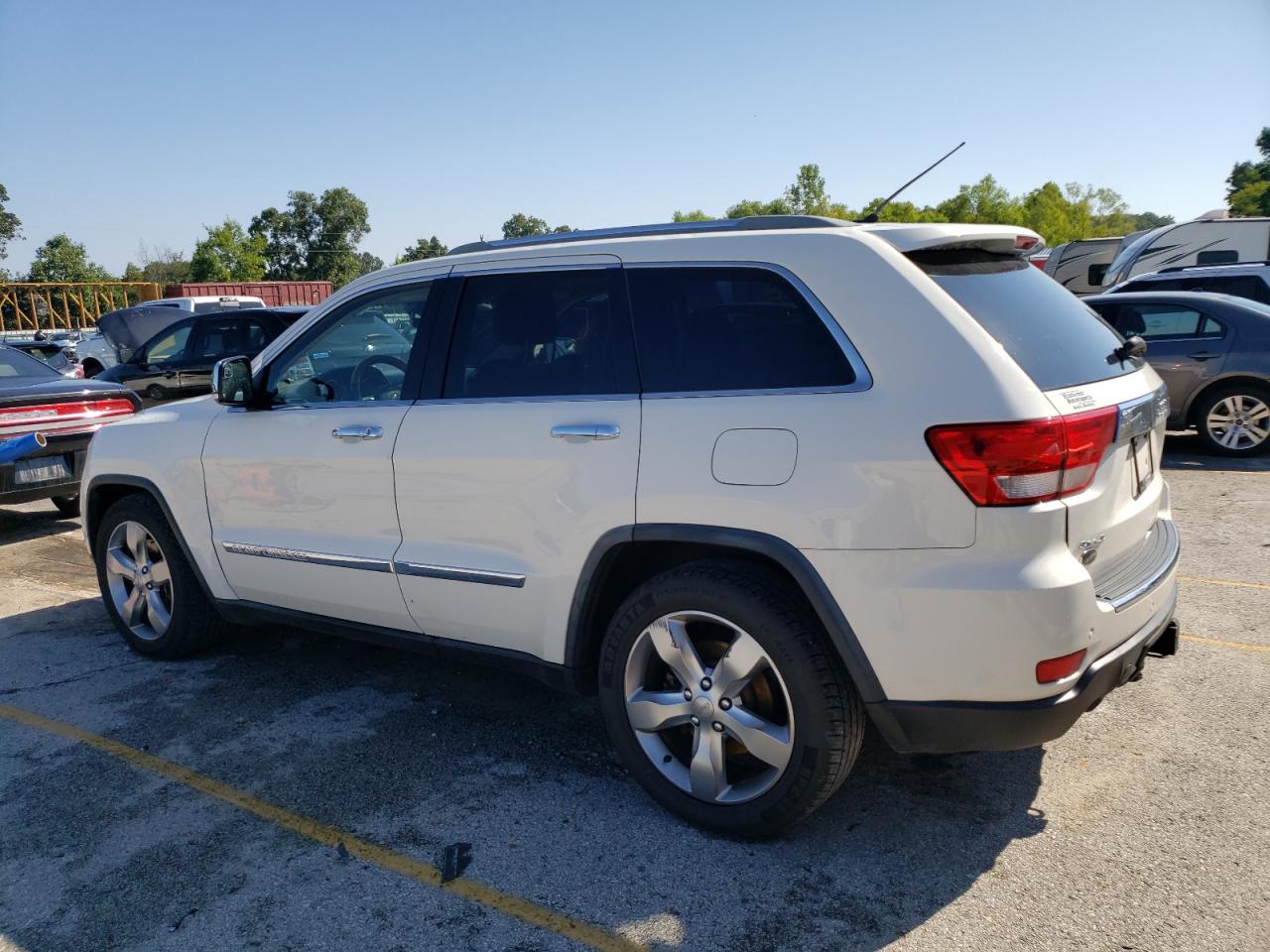 2012 Jeep Grand Cherokee VIN 1C4RJFCT2CC214746 Copart auction photo, hail damage thumbnail 2