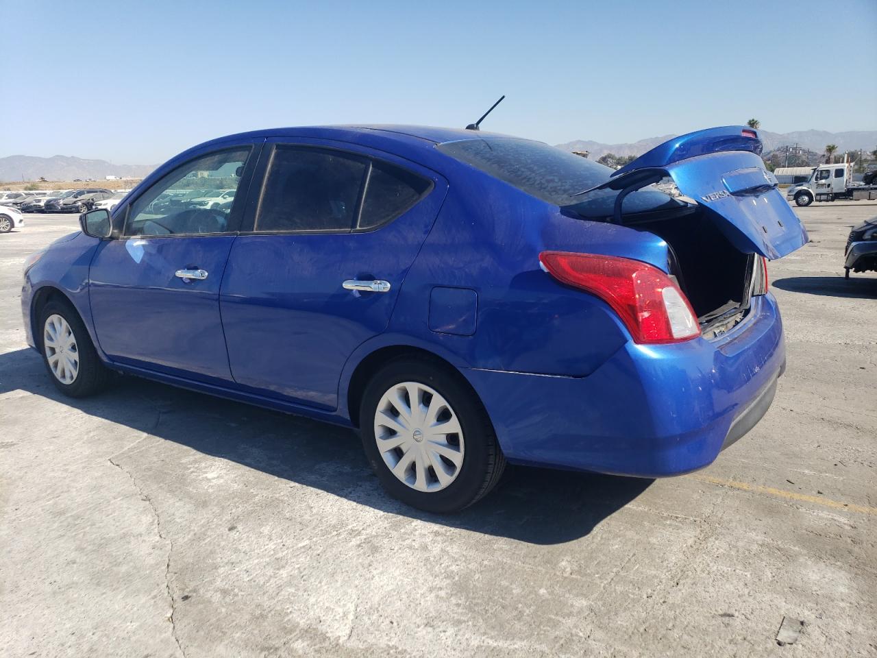 2015 Nissan Versa VIN 3N1CN7AP8FL940225 Copart auction photo, rear end damage thumbnail 2