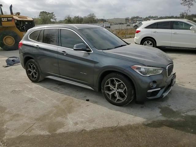 2017 BMW X1 VIN WBXHT3C32H5F74931 Copart auction photo, front end / side damage thumbnail 12