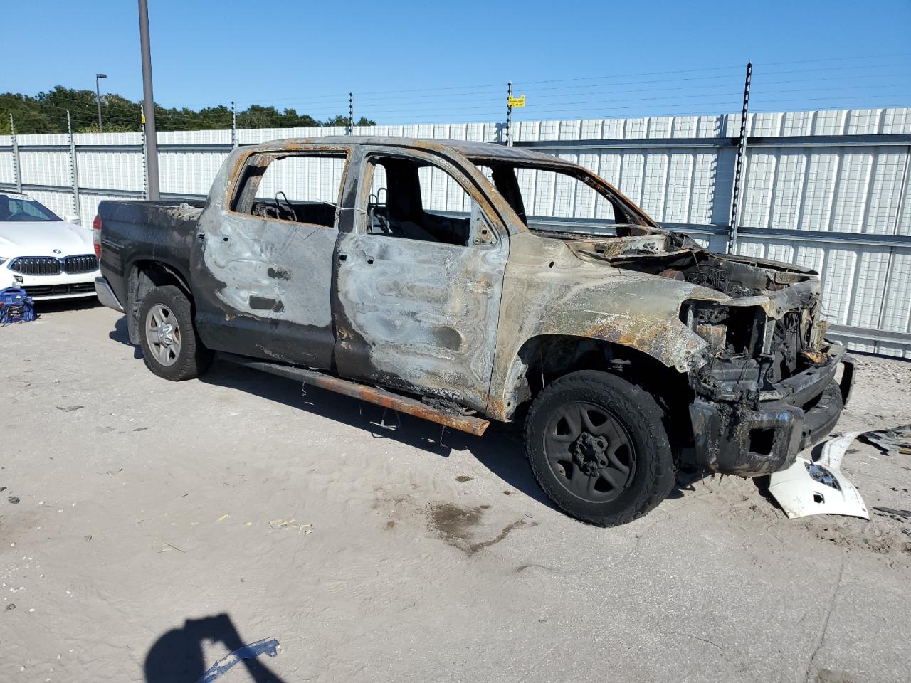 2018 Toyota Tundra VIN 5TFDW5F15JX694867 Copart auction photo, burn damage thumbnail 4