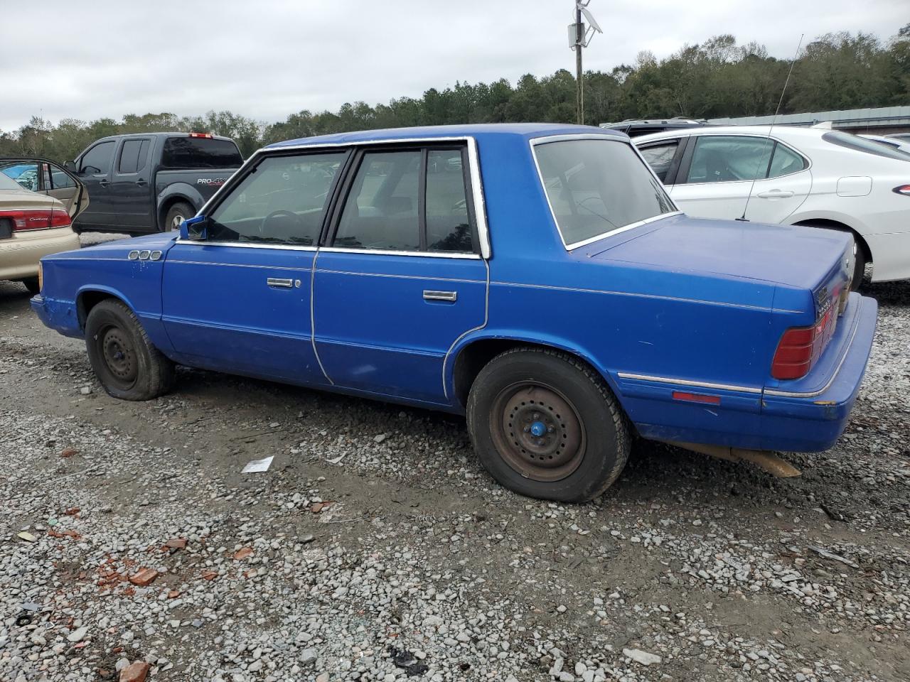 1985 Dodge Aries VIN 1B3BD36CXFF188453 Copart auction photo, top/roof / minor dent/scratches damage thumbnail 2
