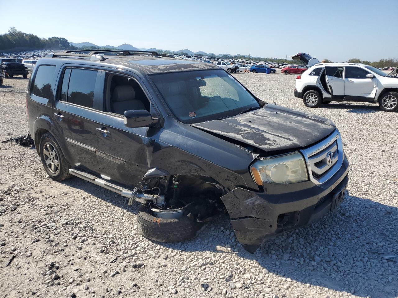 2009 Honda Pilot VIN 5FNYF388X9B024415 Copart auction photo, front end / undercarriage damage thumbnail 4