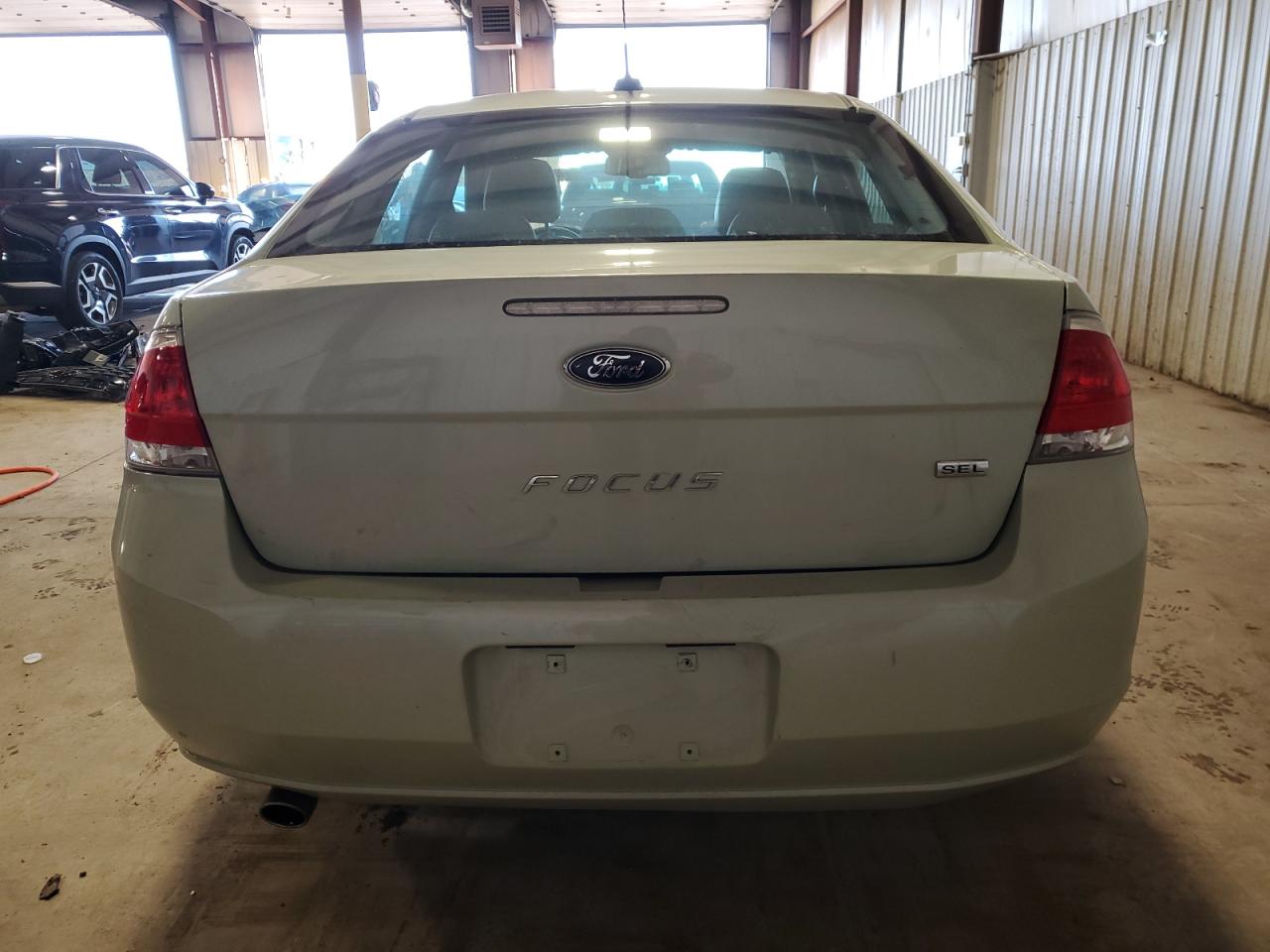 2011 Ford Focus VIN 1FAHP3HN4BW132314 Copart auction photo, side / rear end damage thumbnail 6