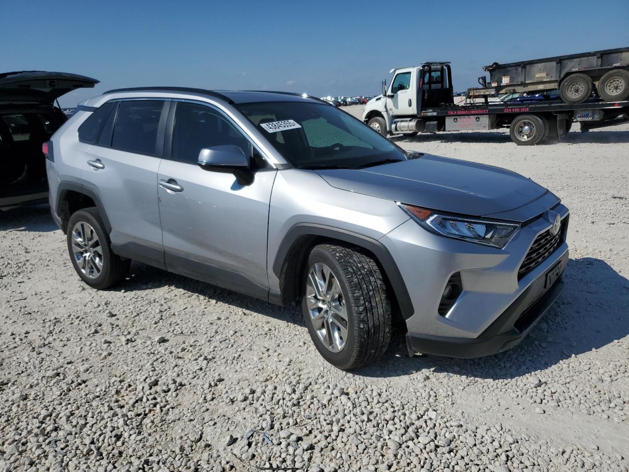 2021 Toyota RAV 4 VIN 2T3C1RFV2MC167755 Copart auction photo, side / front end damage thumbnail 4