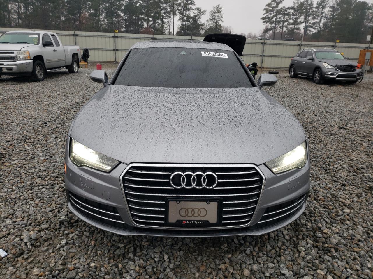 2016 Audi A7 VIN WAU2GAFC7GN001877 Copart auction photo, rear end / undercarriage damage thumbnail 5
