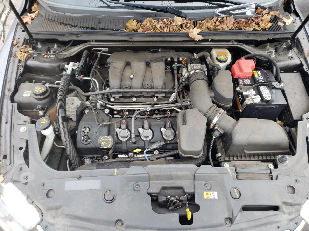 2014 Ford Taurus VIN 1FAHP2E84EG143398 Copart auction photo, all over damage thumbnail 11