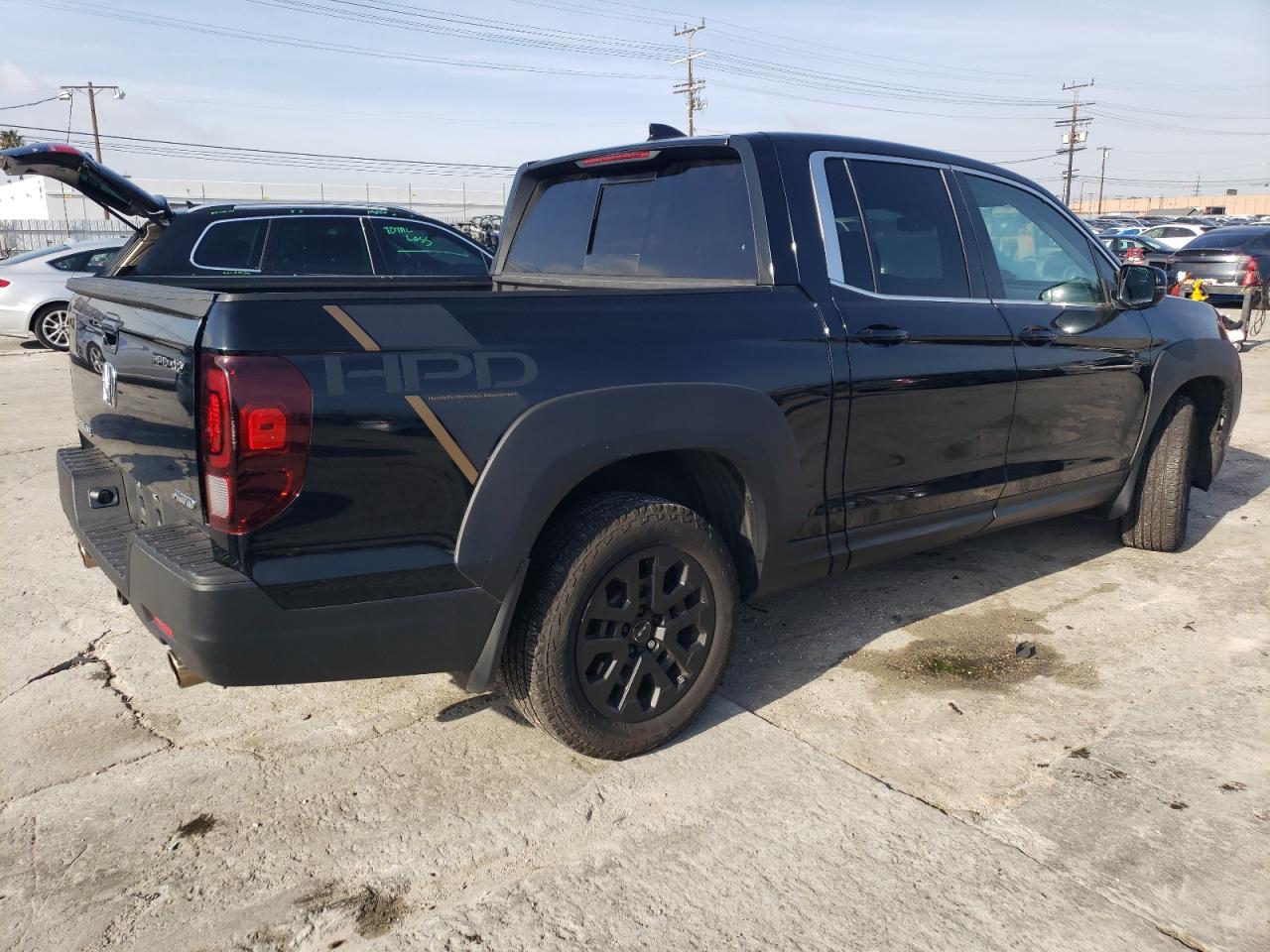 2023 Honda Ridgeline VIN 5FPYK3F52PB023574 Copart auction photo, side damage thumbnail 3