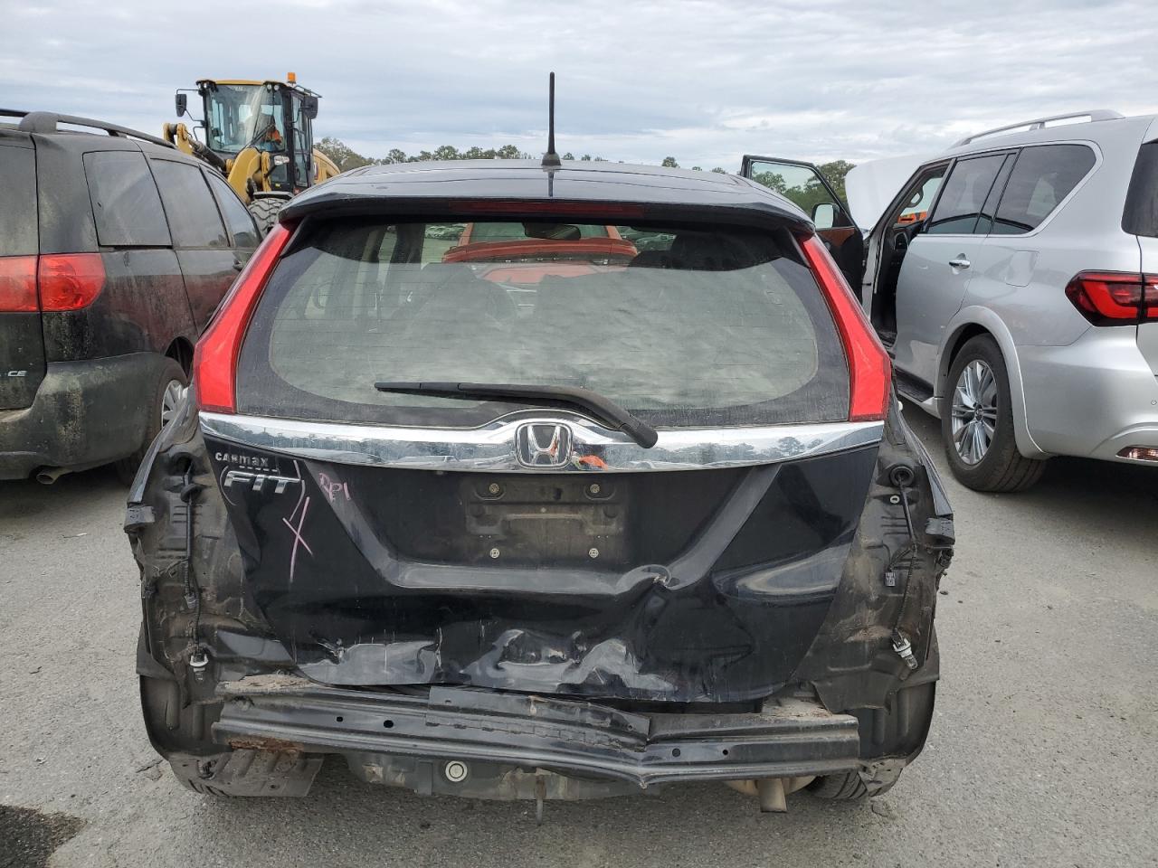 2016 Honda Fit VIN JHMGK5H73GX028267 Copart auction photo, rear end damage thumbnail 6