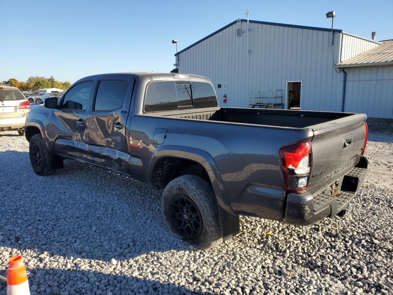 2021 Toyota Tacoma VIN 5TFDZ5BN9MX059512 Copart auction photo, side / rear end damage thumbnail 2