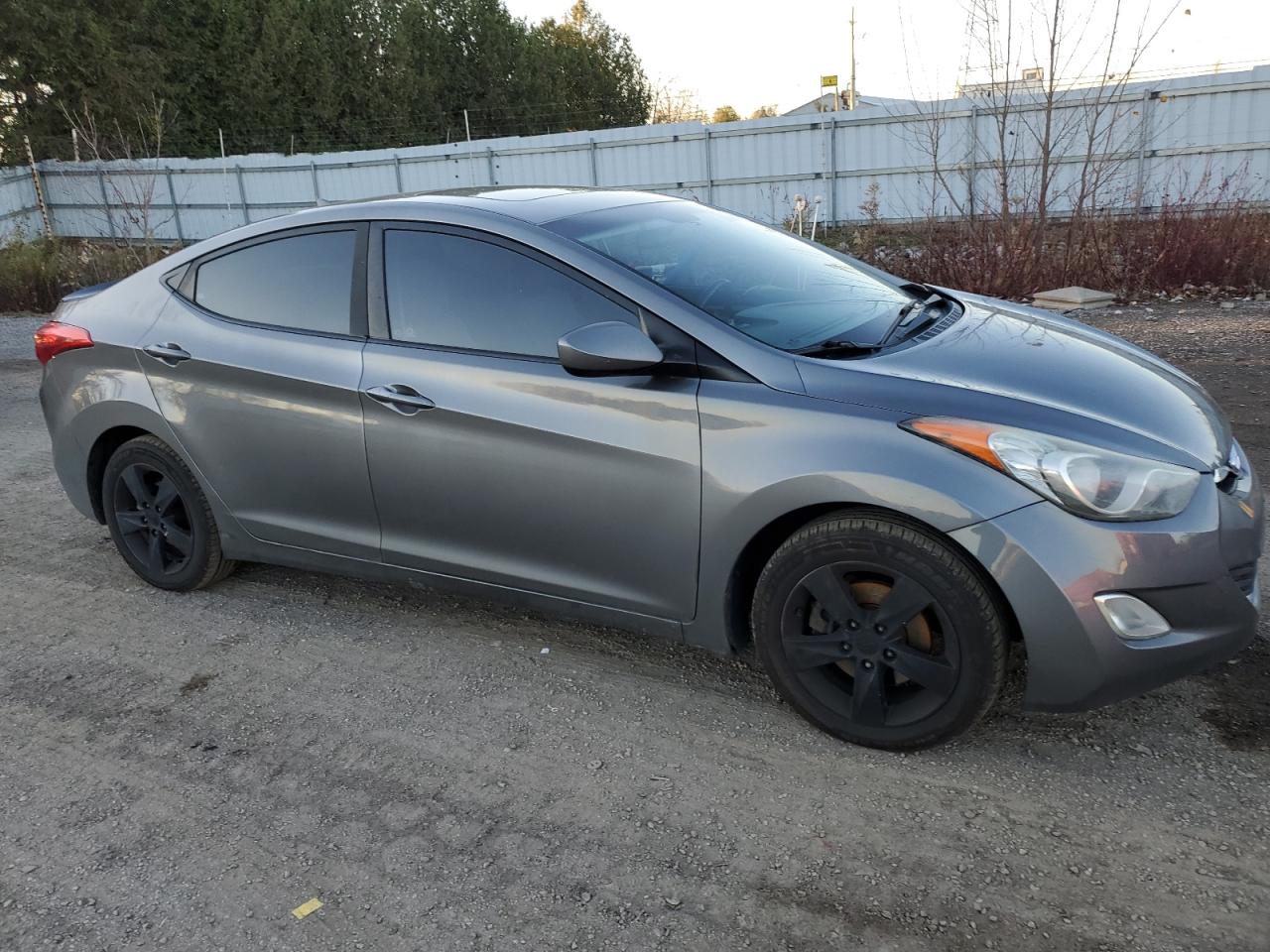2012 Hyundai Elantra VIN 5NPDH4AE1CH114950 Copart auction photo, front end / side damage thumbnail 4
