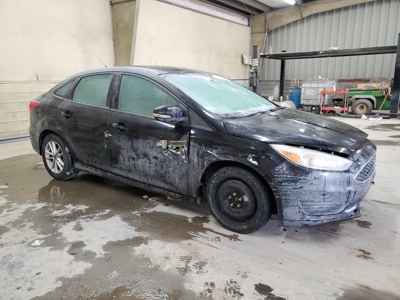 2016 Ford Focus VIN 1FADP3F27GL386003 Copart auction photo, side / minor dent/scratches damage thumbnail 4