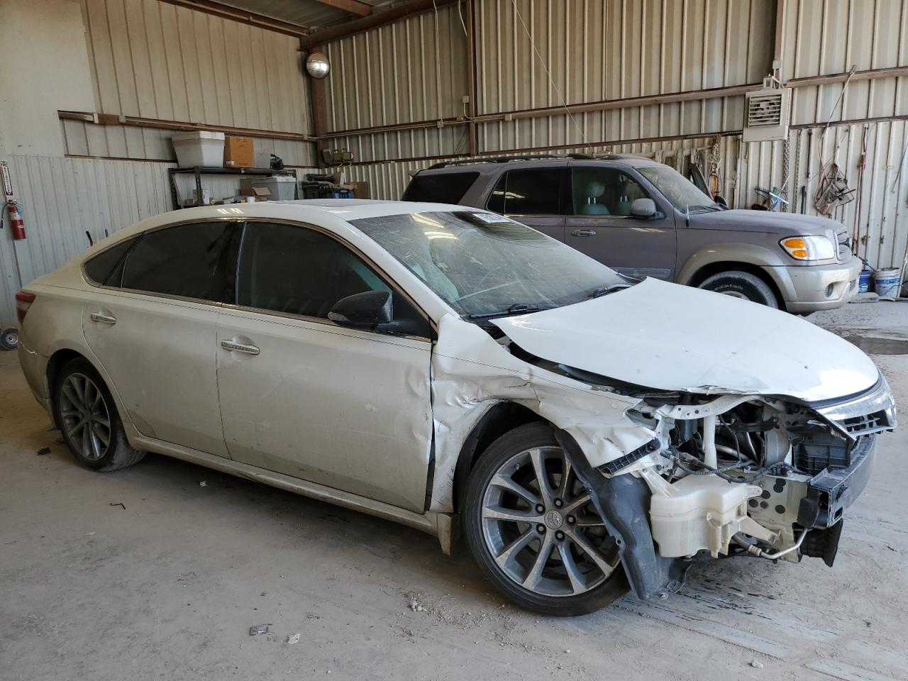 2015 Toyota Avalon VIN 4T1BK1EBXFU173931 Copart auction photo, front end / hail damage thumbnail 4