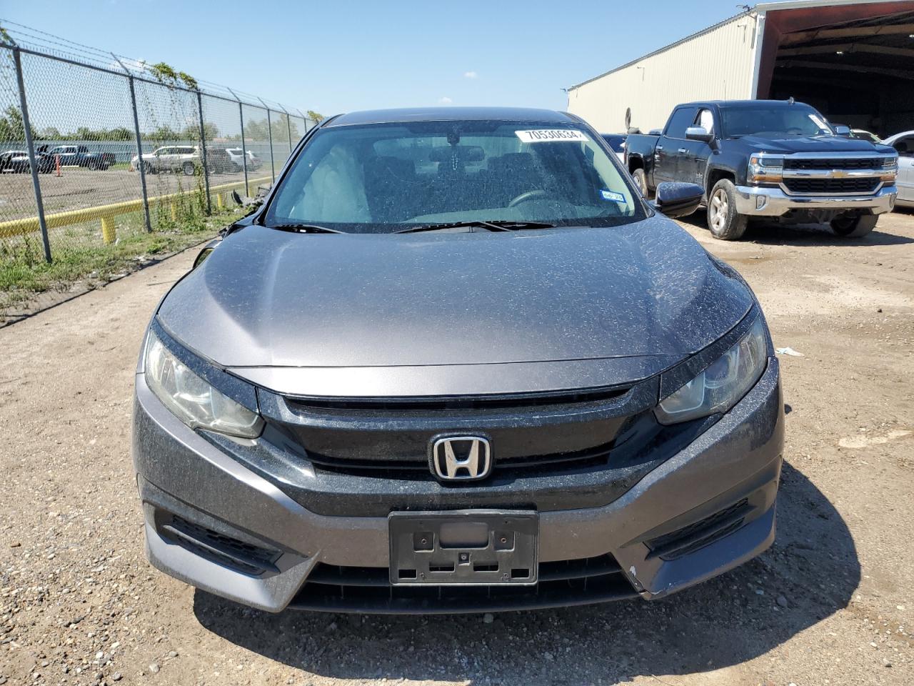 2017 Honda Civic VIN 19XFC2F57HE077225 Copart auction photo, side / front end damage thumbnail 5