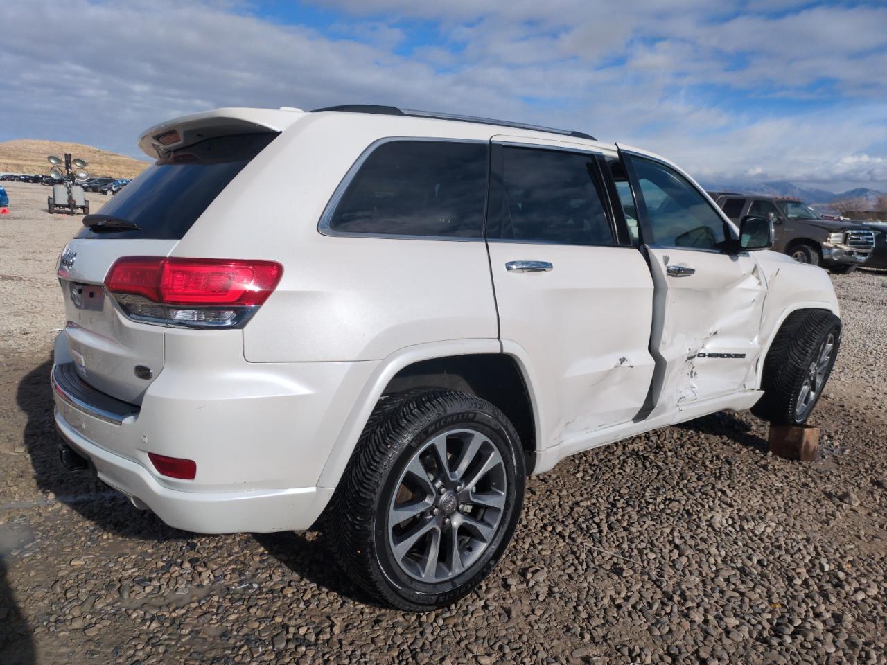 2017 Jeep Grand Cherokee VIN 1C4RJFCG7HC707767 Copart auction photo, side / front end damage thumbnail 3